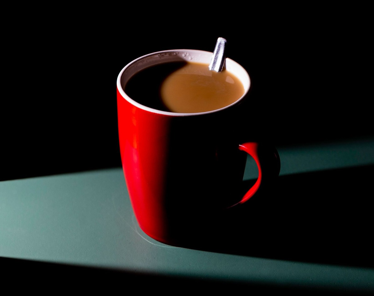 coffee cup with steam and milk