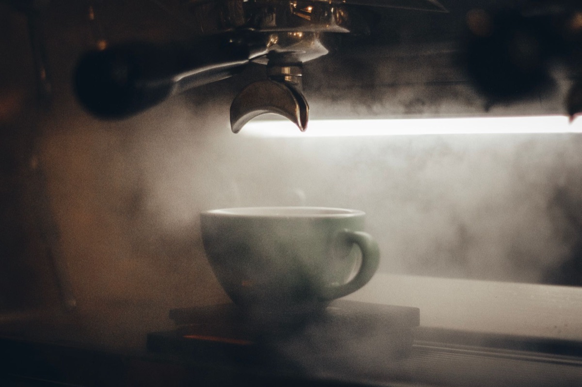 coffee cup with steam and aroma